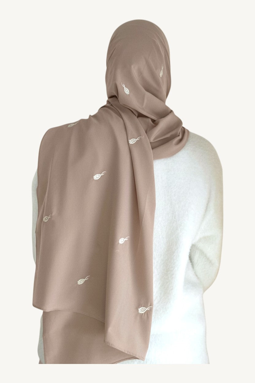Beige hijab with repeated tulip embroidery in lightweight polyester fabric