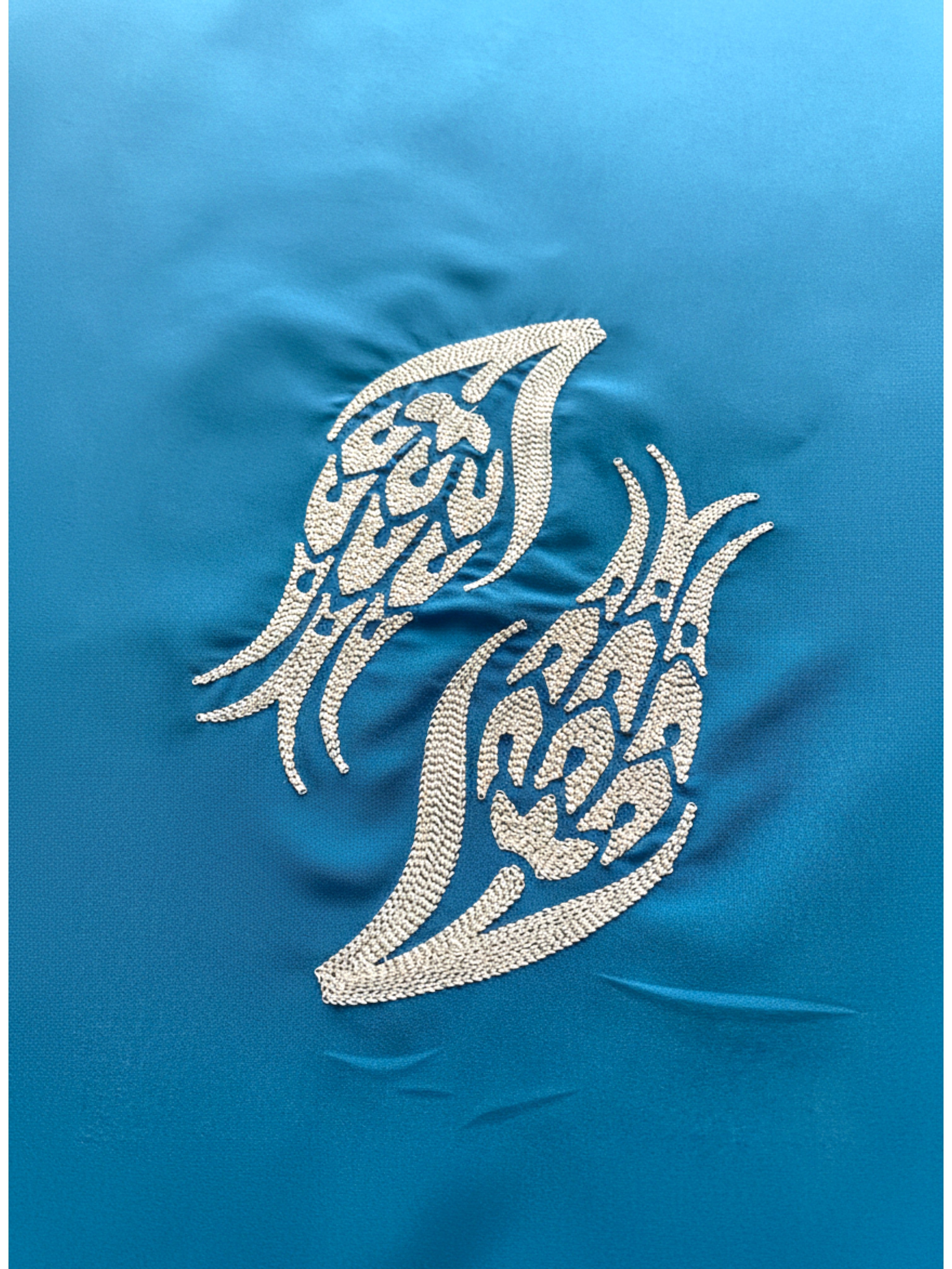 Blue hijab with iznik tulip embroidery in lightweight polyester fabric