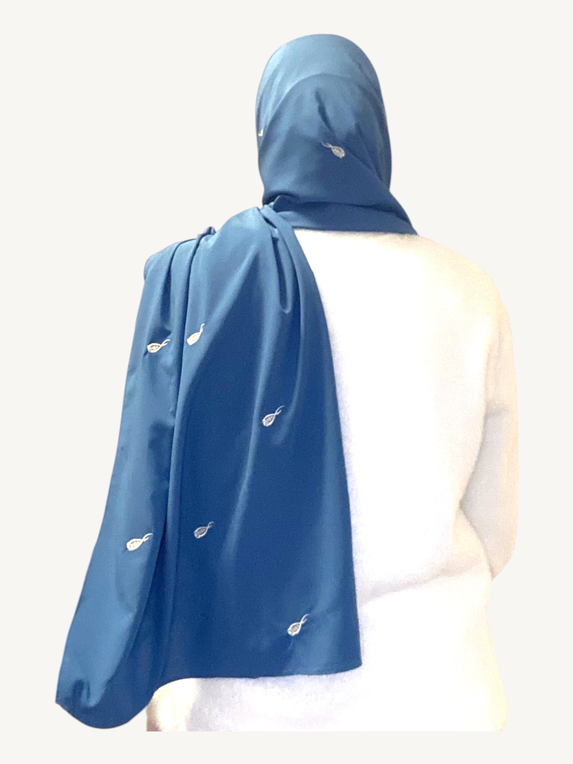 Blue hijab with repeated tulip embroidery in lightweight polyester fabric