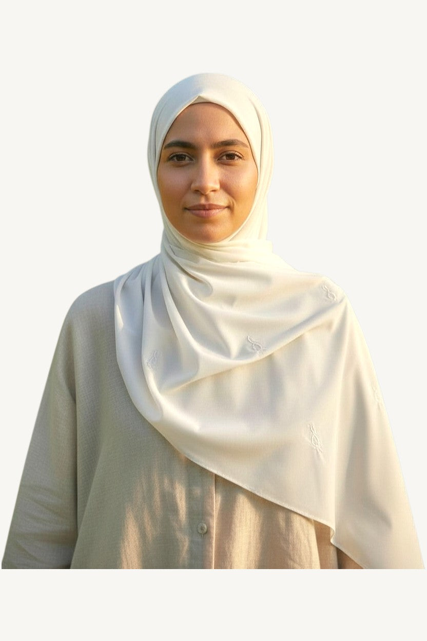 White hijab with repeated tulip embroidery in lightweight polyester fabric