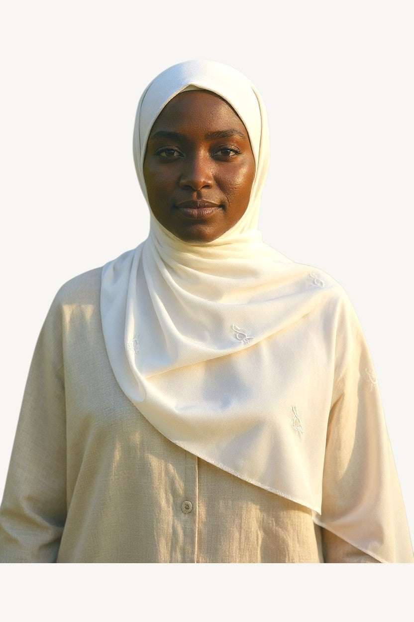 White hijab with repeated tulip embroidery in lightweight polyester fabric